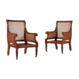 A PAIR OF MAHOGANY LIBRARY ARMCHAIRS IN REGENCY STYLE