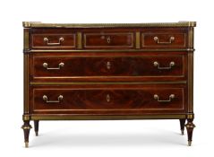 A LOUIS XVI MAHOGANY AND BRASS MOUNTED COMMOD