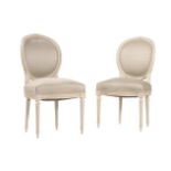 A PAIR OF FRENCH CREAM PAINTED SIDE CHAIRS