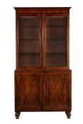 A REGENCY MAHOGANY BOOKCASE OR DISPLAY CABINET