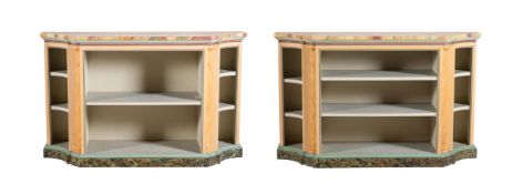 A PAIR OF PAINTED AND SIMULATED OPEN BOOKCASES
