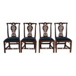 A SET OF FOUR GEORGE III MAHOGANY SIDE CHAIRS, POSSIBLY IRISH