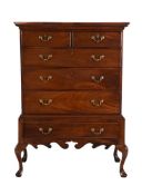 A MAHOGANY CHEST ON STAND IN GEORGE III STYLE