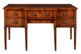 A GEORGE III MAHOGANY BREAKFRONT SIDEBOARD