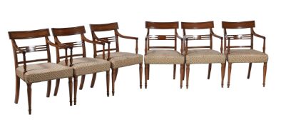 A SET OF SIX REGENCY MAHOGANY ARMCHAIRS