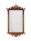 A GEORGE II MAHOGANY AND GILTWOOD WALL MIRROR MID 18TH CENTURY