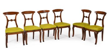 A SET OF SIX CONTINENTAL WALNUT DINING CHAIRS