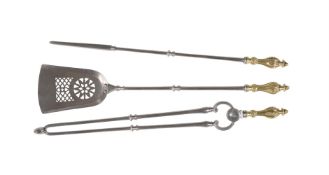 A SET OF THREE BRASS AND POLISHED STEEL FIRE TOOLS