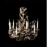 A GILT METAL AND GLASS CHANDELIERIN THE MANNER OF MAISON BAGUES