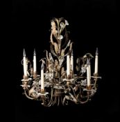 A GILT METAL AND GLASS CHANDELIERIN THE MANNER OF MAISON BAGUES