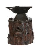 A BLACK FOREST TOBACCO JAR WITH HINGED COVER