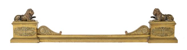 A REGENCY BRASS FIRE FENDER