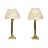 A PAIR OF BRASS TABLE LAMPS