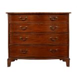 A GEORGE III MAHOGANY AND LINE INLAID SERPENTINE CHEST OF DRAWERS