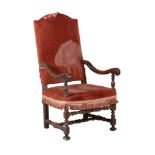 A WALNUT HIGH BACK ARMCHAIR IN LATE 17TH CENTURY STYLE