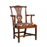 A GEORGE III MAHOGANY ARMCHAIR