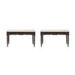 Y A PAIR OF ANGLO INDIAN EBONY CONSOLE TABLES WITH LATER MARBLE TOPS
