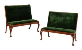 A PAIR OF WALNUT AND UPHOLSTERED HALL BENCHES IN GEORGE II STYLE