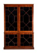 A REGENCY MAHOGANY AND LINE INLAID LIBRARY BOOKCASE