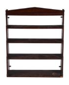 A REGENCY MAHOGANY HANGING WATERFALL BOOKCASE