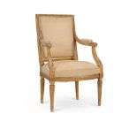 A FRENCH GILTWOOD FAUTEUIL IN LOUIS XVI STYLE