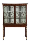 A MAHOGANY AND PARCEL GILT DISPLAY CABINET IN GEORGE III STYLE