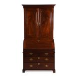 A GEORGE II MAHOGANY BUREAU CABINET