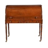 A GEORGE IV MAHOGANY CYLINDER WRITING DESK