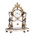 AN ALABASTER AND GILT METAL MOUNTED MANTEL CLOCK