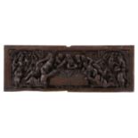 A CARVED OAK PANEL