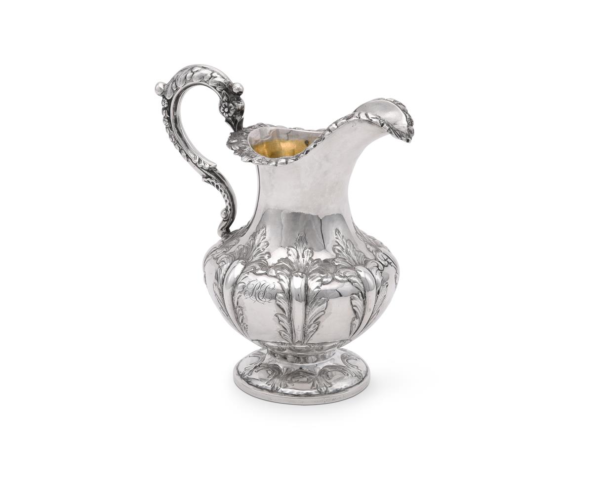 A VICTORIAN SILVER BALUSTER CREAM JUG