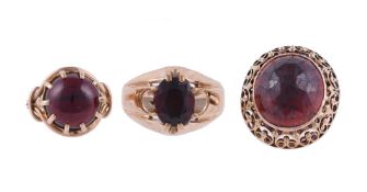 THREE GARNET DRESS RINGS