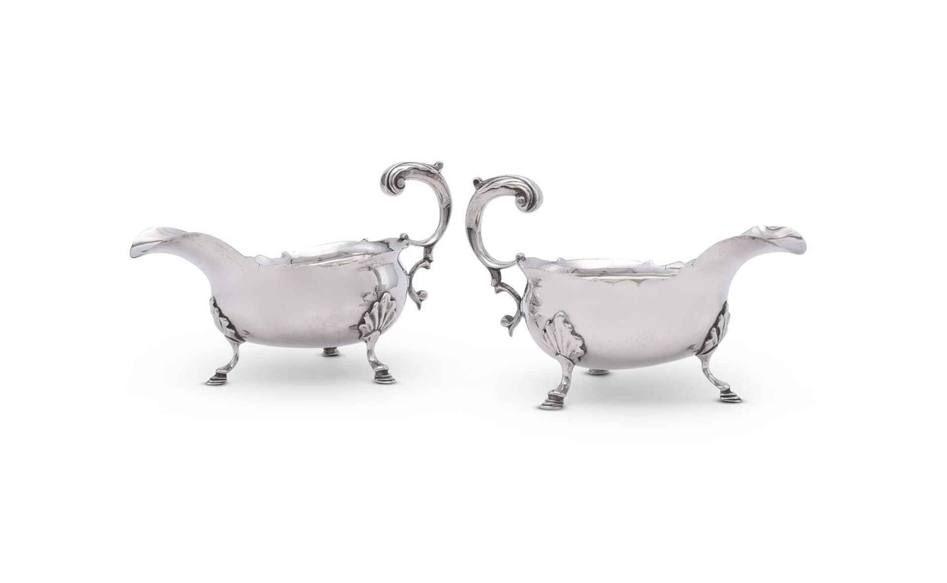 A PAIR OF GEORGE II SILVER SHAPED OVAL SAUCE BOATS