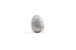 A SILVER COLOURED ACORN SHAPED NUTMEG GRATER