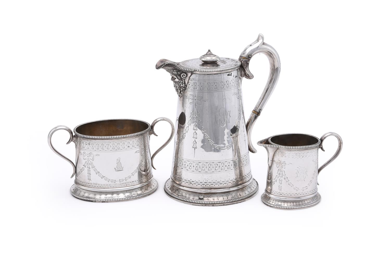 Y A VICTORIAN SCOTTISH SILVER OVAL THREE PIECE TEA SET