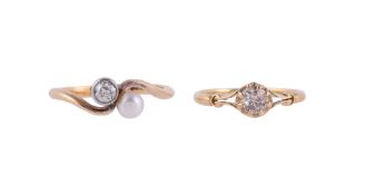 A DIAMOND AND PEARL CROSSOVER RING AND A DIAMOND SINGLE STONE RING
