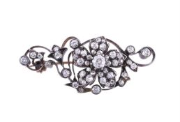 A VICTORIAN DIAMOND FLOWER BROOCH, CIRCA 1880