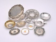 TWELVE CONTINENTAL SILVER COLOURED DISHES