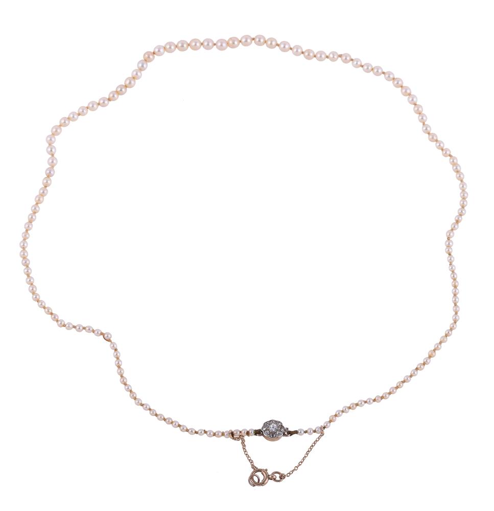 A GRADUATED PEARL NECKLACE WITH DIAMOND CLASP