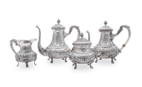 Y AN EGYPTIAN SILVER COLOURED FOUR PIECE TEA SET