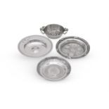 FOUR SILVER AND SILVER COLOURED DISHES