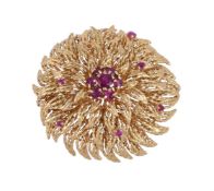 A RUBY FLOWER HEAD CLUSTER BROOCH