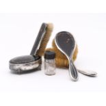 Y A SET OF THREE SILVER MOUNTED AND TORTOISESHELL DRESSING TABLE BRUSHES, MAPPIN & WEBB