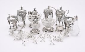 A DUTCH SILVER COLOURED MOUNTED THREE PIECE CRUET SET