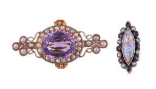 AN EDWARDIAN AMETHYST AND HALF PEARL BROOCH, CIRCA 1910