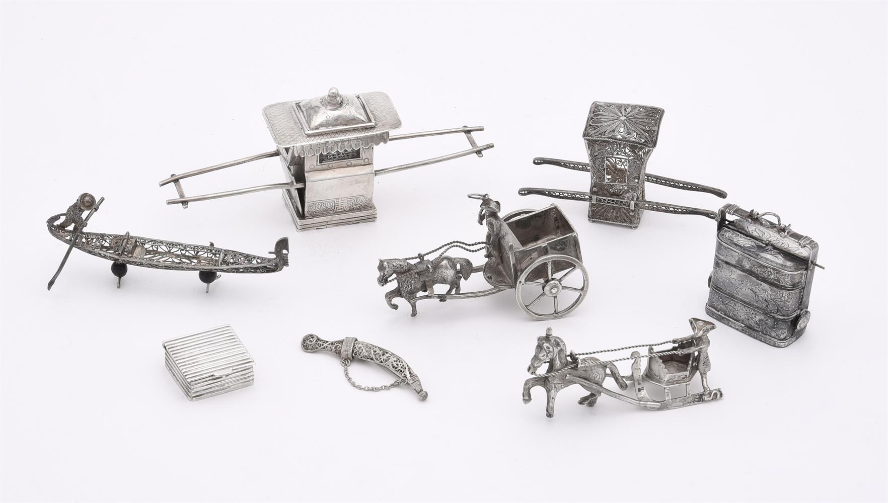 A COLLECTION OF MINIATURE SILVER COLOURED ITEMS