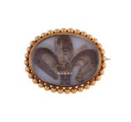 A MID GEORGE III HAIRWORK BROOCH, CIRCA 1800