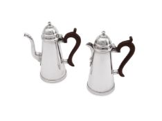 A PAIR OF SILVER TAPERING CAFE AU LAIT POTS