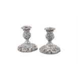 A MATCHED PAIR OF VICTORIAN SILVER CANDLESTICKS