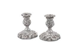 A MATCHED PAIR OF VICTORIAN SILVER CANDLESTICKS